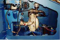 Delimber engine compartment